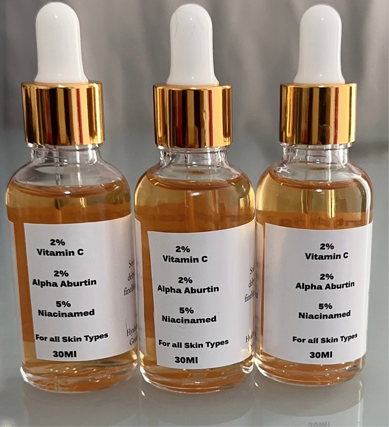 Alpha Aburtin, Niacinamed, Vitamin C Brightening Face Serum 30ml remove